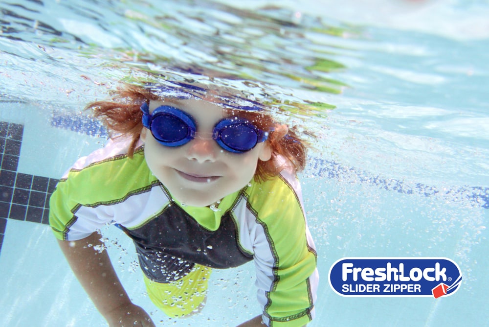 kid swimming in pool