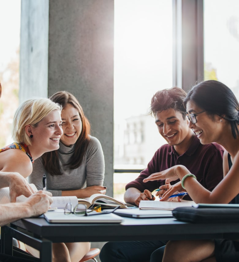 students gathered around a table