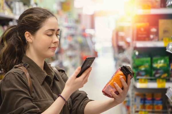 women looking at flexible pouch packaging